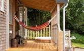 While away the hours in the relaxing hammocks.  - Thumbnail Image