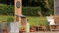 Enjoy warm, sun-dappled evenings with outdoor games.