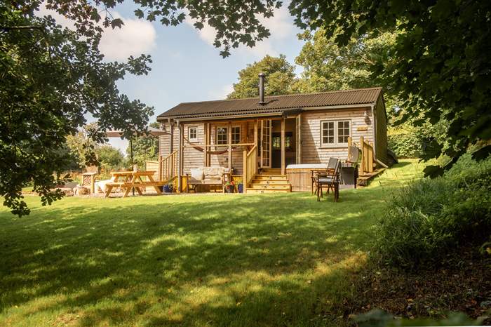 The Little Woodland House is a Family size cabin with hot tub near Fowey, South Cornwall.