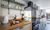 Conjure up a feast in the well-equipped kitchen, perfect for entertaining. - Thumbnail Image