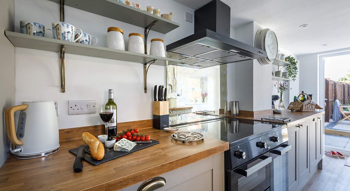 Conjure up a feast in the well-equipped kitchen, perfect for entertaining.