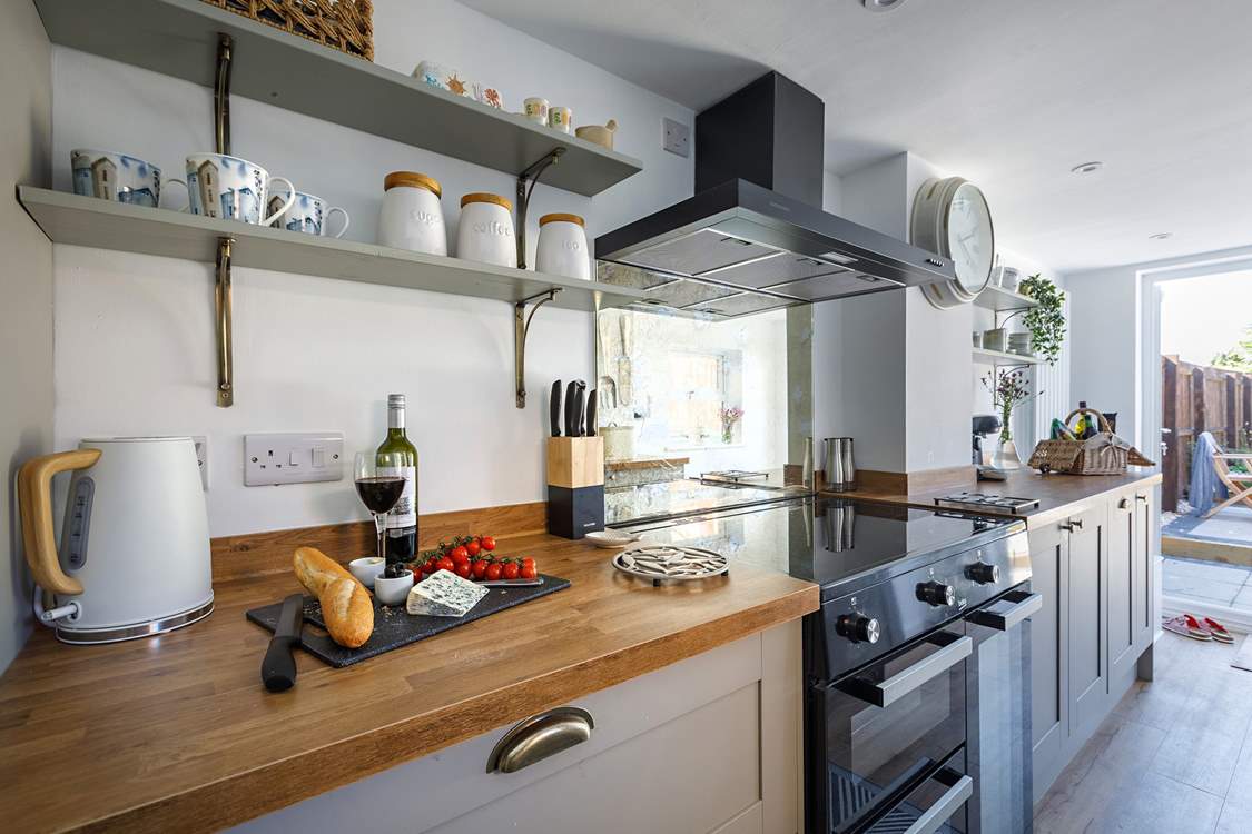 Conjure up a feast in the well-equipped kitchen, perfect for entertaining.