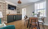 Dining in style with plenty of room to store the fizz in the wine fridge! - Thumbnail Image