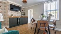 Dining in style with plenty of room to store the fizz in the wine fridge!