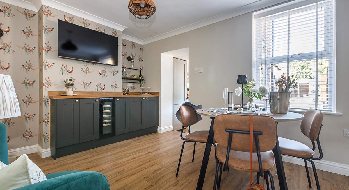 Dining in style with plenty of room to store the fizz in the wine fridge!