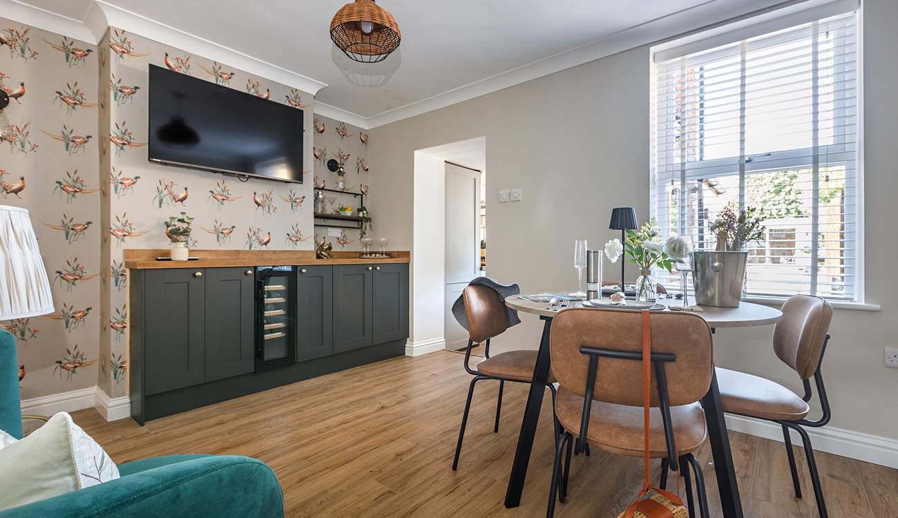 Dining in style with plenty of room to store the fizz in the wine fridge!