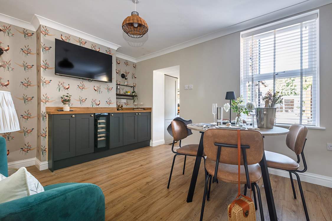 Dining in style with plenty of room to store the fizz in the wine fridge!