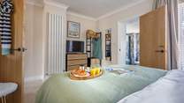 The beautiful main bedroom with luxury en suite.
