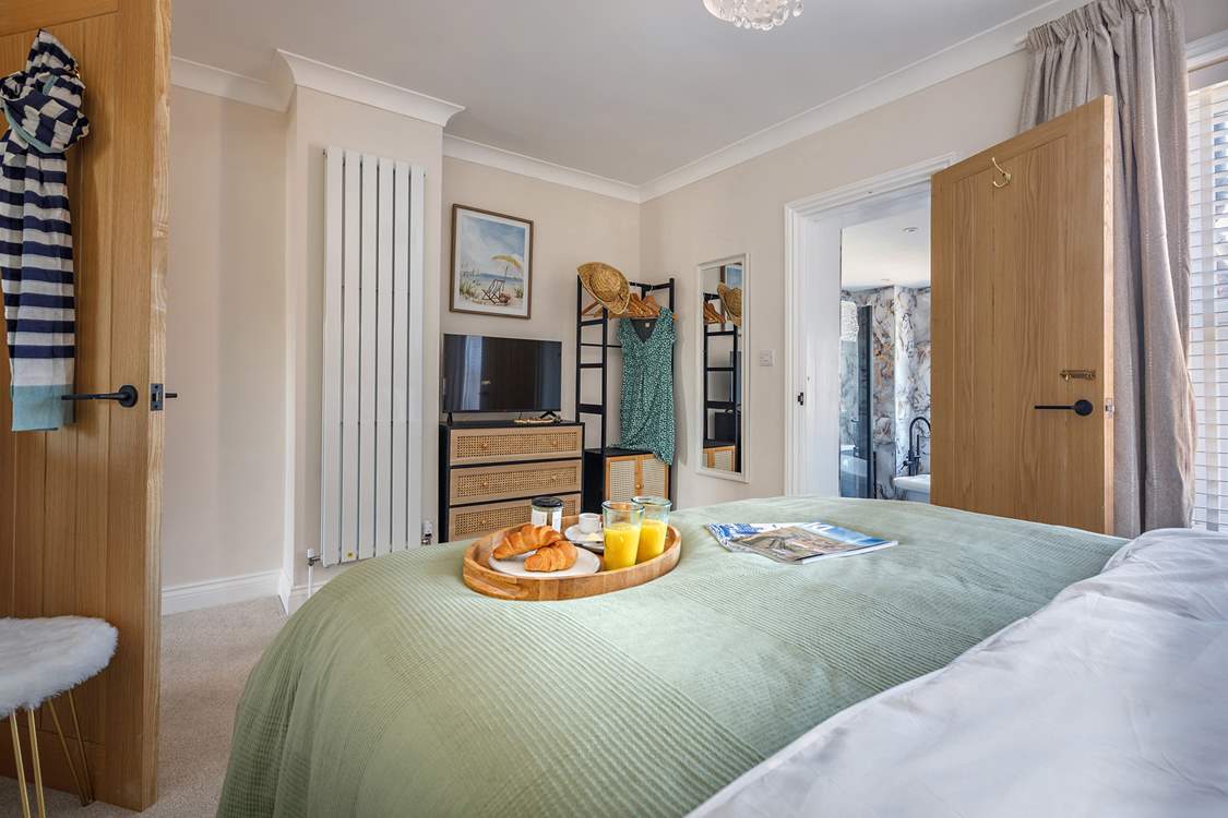 The beautiful main bedroom with luxury en suite.