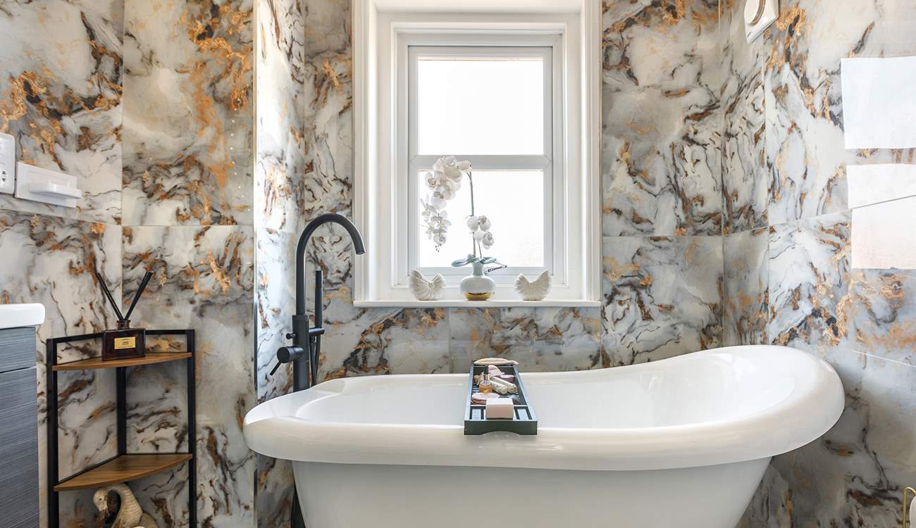 Enjoy a luxurious bath after a busy day exploring this stunning coastline.