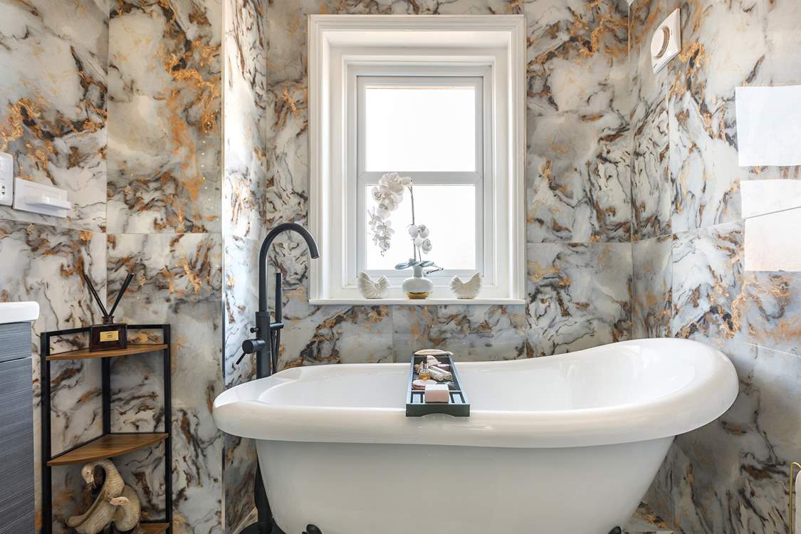 Enjoy a luxurious bath after a busy day exploring this stunning coastline.