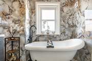Enjoy a luxurious bath after a busy day exploring this stunning coastline.