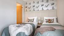 Adults or children can enjoy this relaxing space with private en suite bathroom.