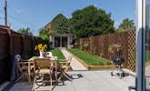 The garden is perfect for al fresco dining, the summer-house is currently not available for guests' use.  - Thumbnail Image