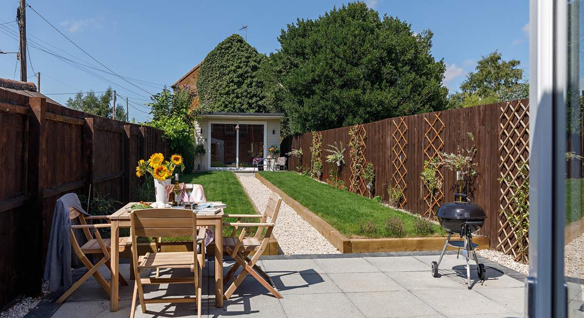 The garden is perfect for al fresco dining, the summer-house is currently not available for guests' use. 
