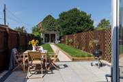 The garden is perfect for al fresco dining. There is a delightful summer-house with 6' 3