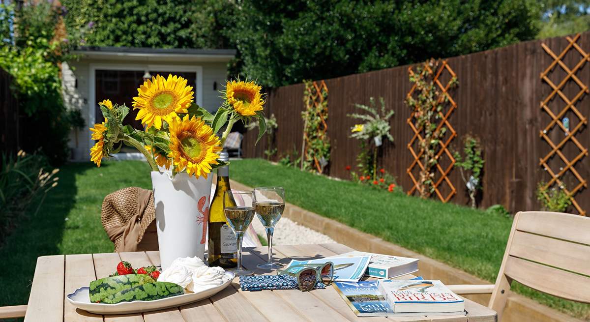 Enjoy the sunshine in the pretty garden; the summer-house is not available at the present time.