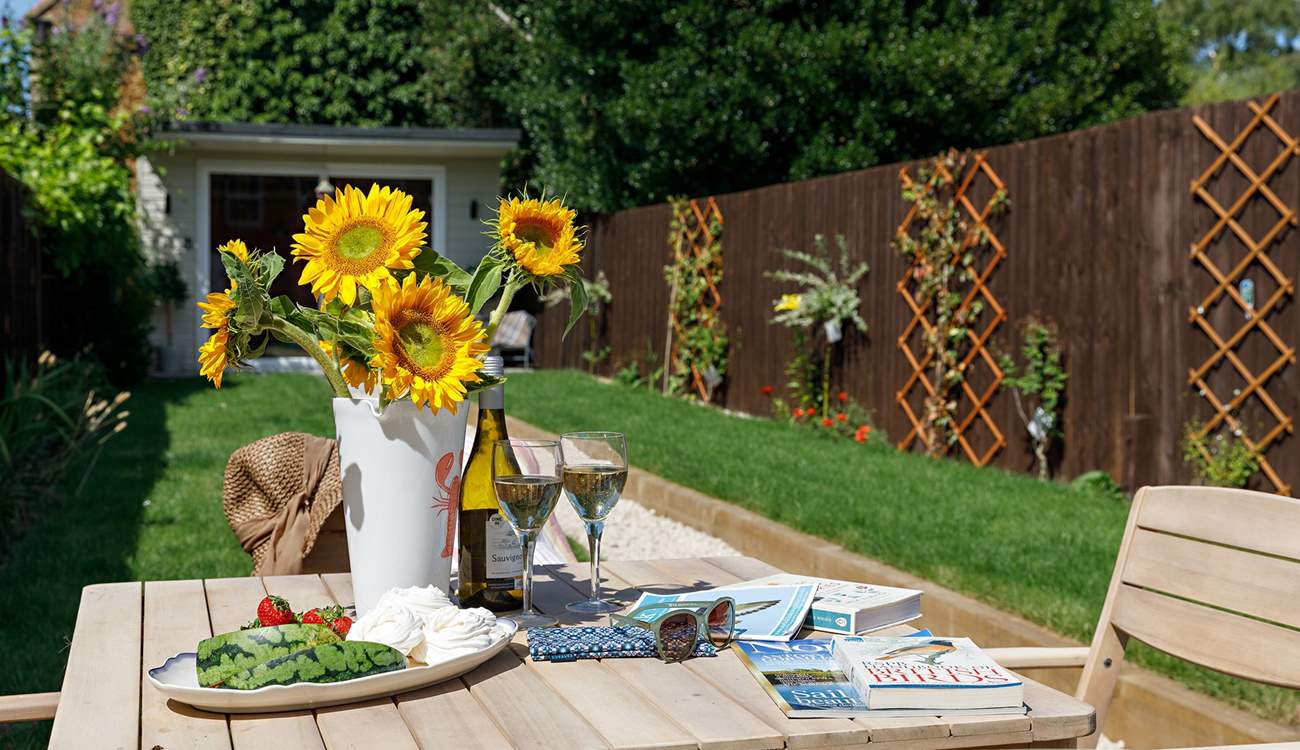 Enjoy the sunshine in the pretty garden.