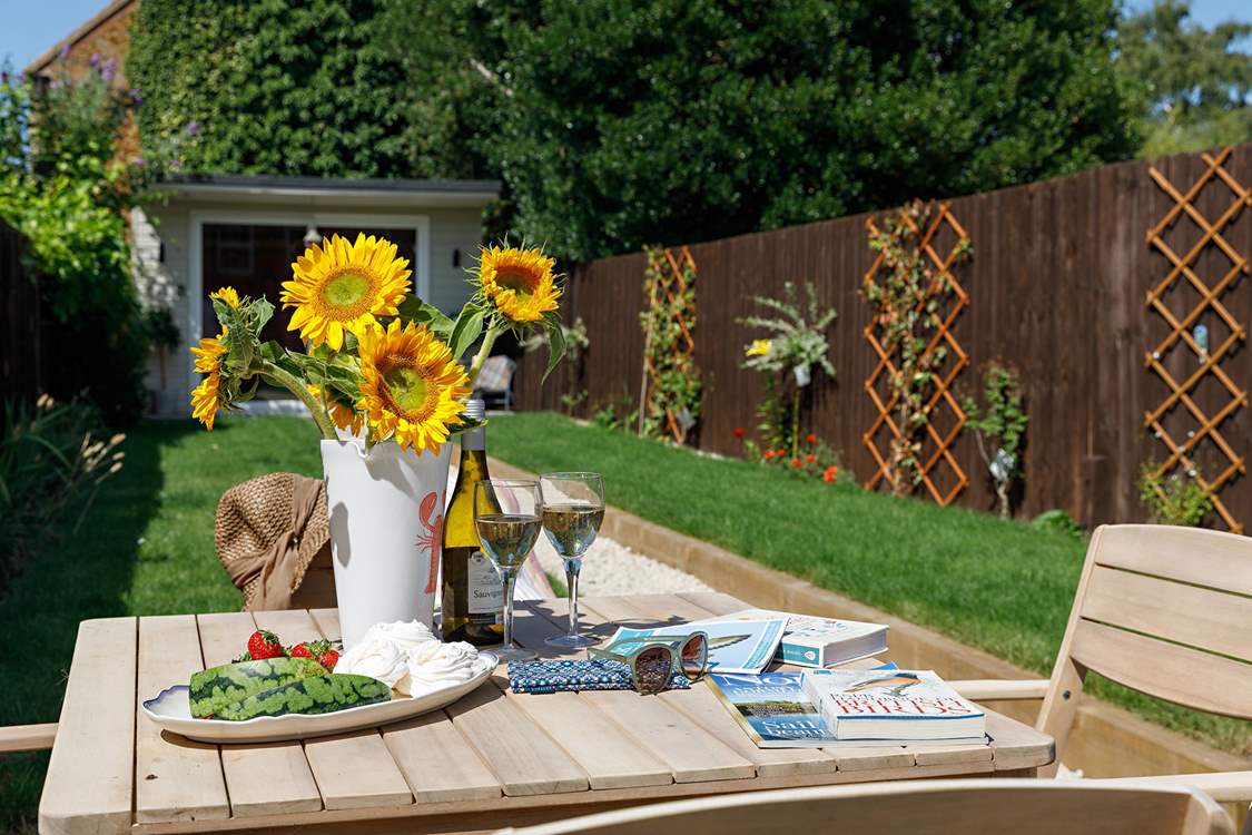 Enjoy the sunshine in the pretty garden; the summer-house is not available at the present time.