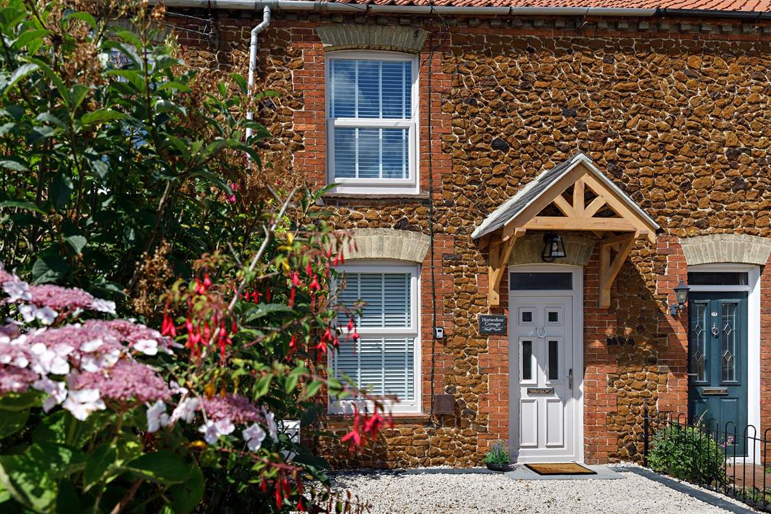 Such a pretty cottage.
