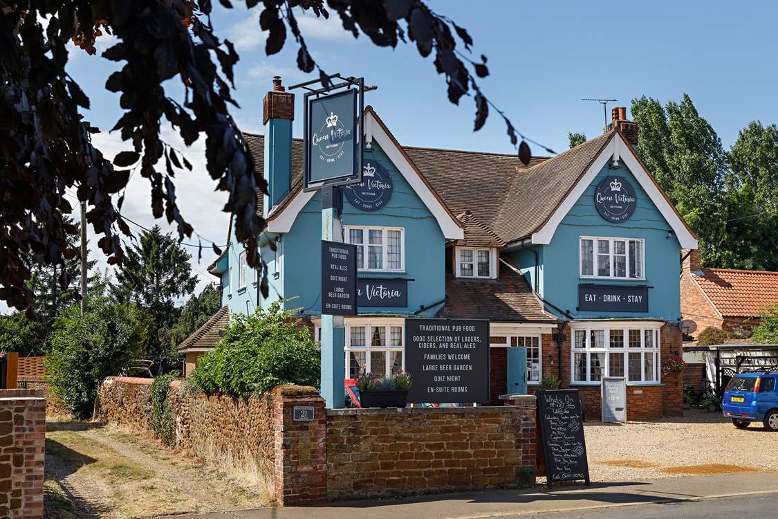 Enjoy a Pimms in the garden at The Queen Victoria, a two minute walk from the cottage.