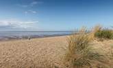 Explore the dunes and admire the changing tide. - Thumbnail Image