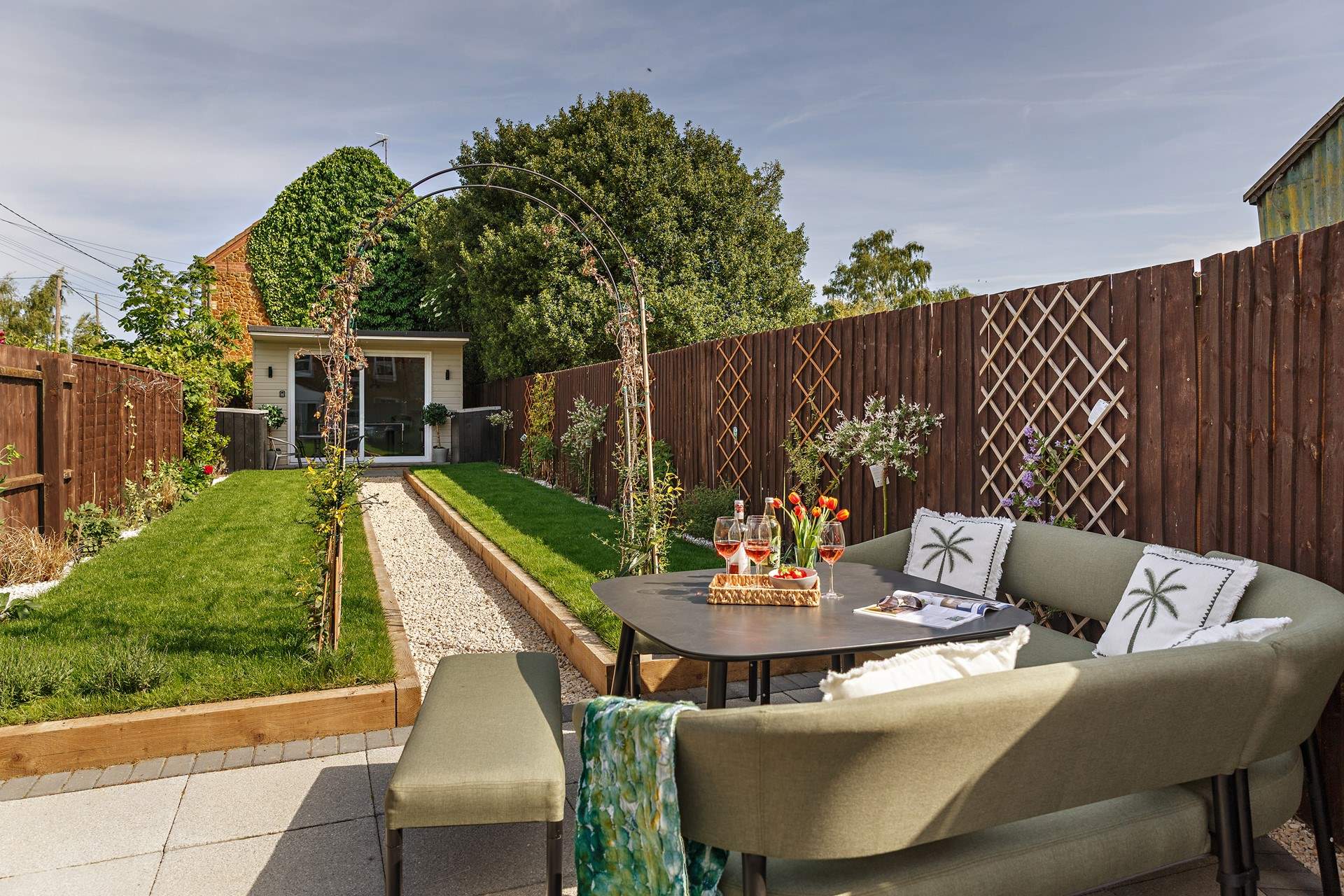Enjoy the sunshine in the pretty garden.