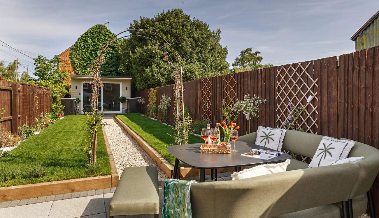 Enjoy the sunshine in the pretty garden.