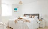 Sink into the huge bed in bedroom 1. - Thumbnail Image