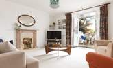 A sitting-room that leads out to the second courtyard via the second set of original double doors. - Thumbnail Image