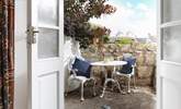 The terrace outside of the sitting-room showing the flags on the promenade in the distance. - Thumbnail Image