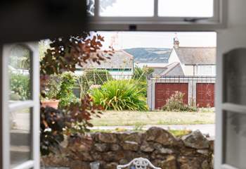 You have allocated parking across the lane, here you can see the sea view from the sitting-room.