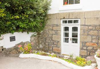 Beautiful original doors welcome you into this characterful home.