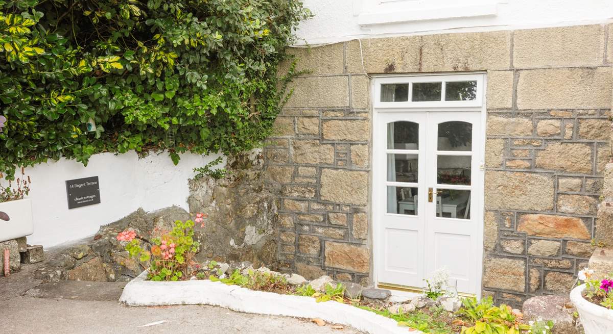Beautiful original doors welcome you into this characterful home.