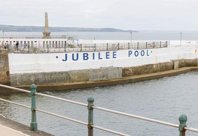 The iconic Art Deco Jubilee Pool directly opposite the apartment welcomes all the family.