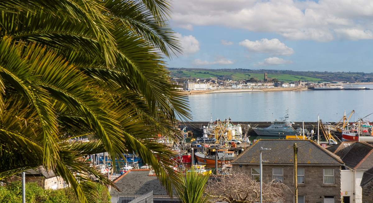 Bustling Newlyn harbour looking across to Penzance.