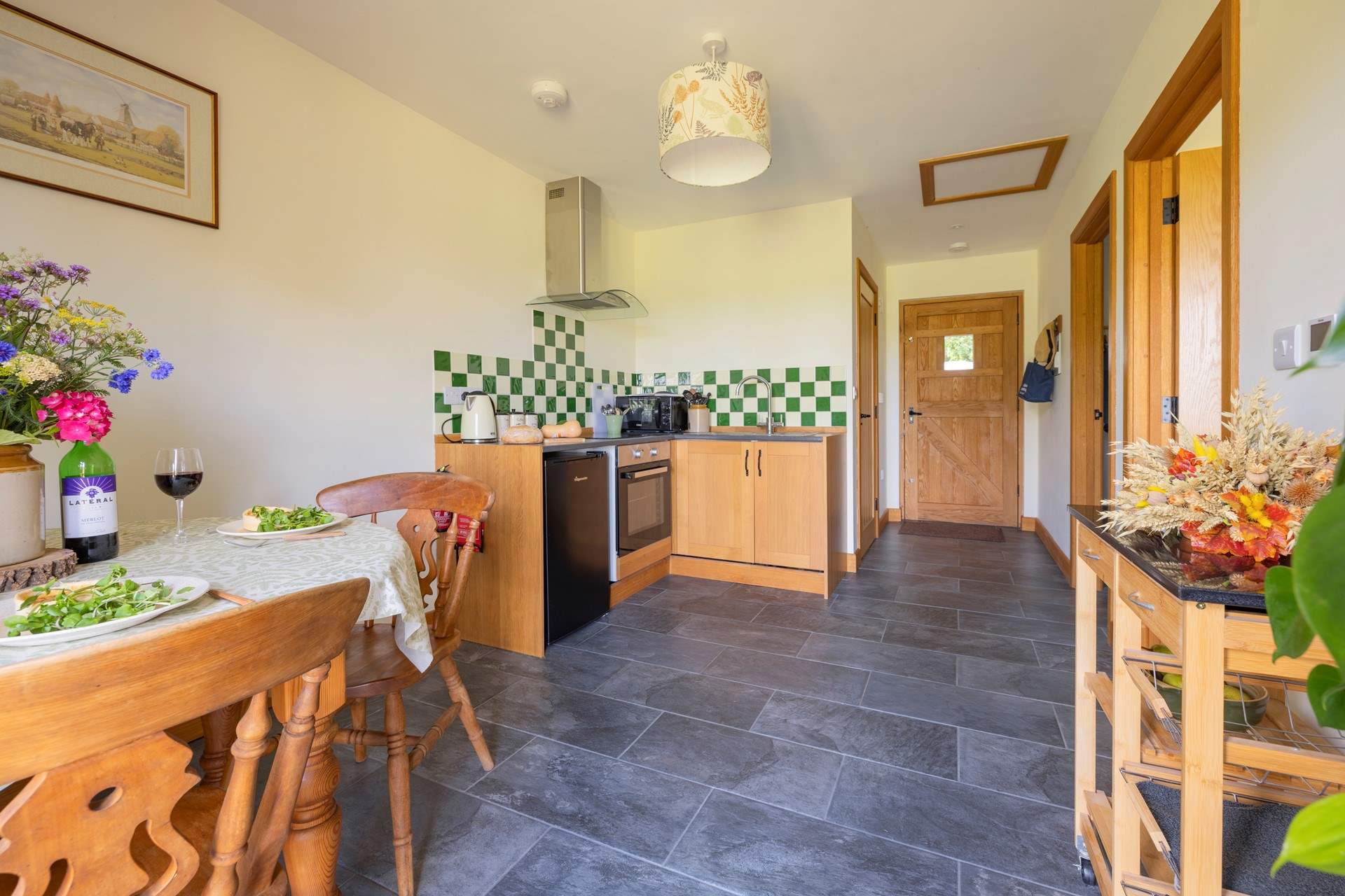 The main door opens into the kitchen/diner.