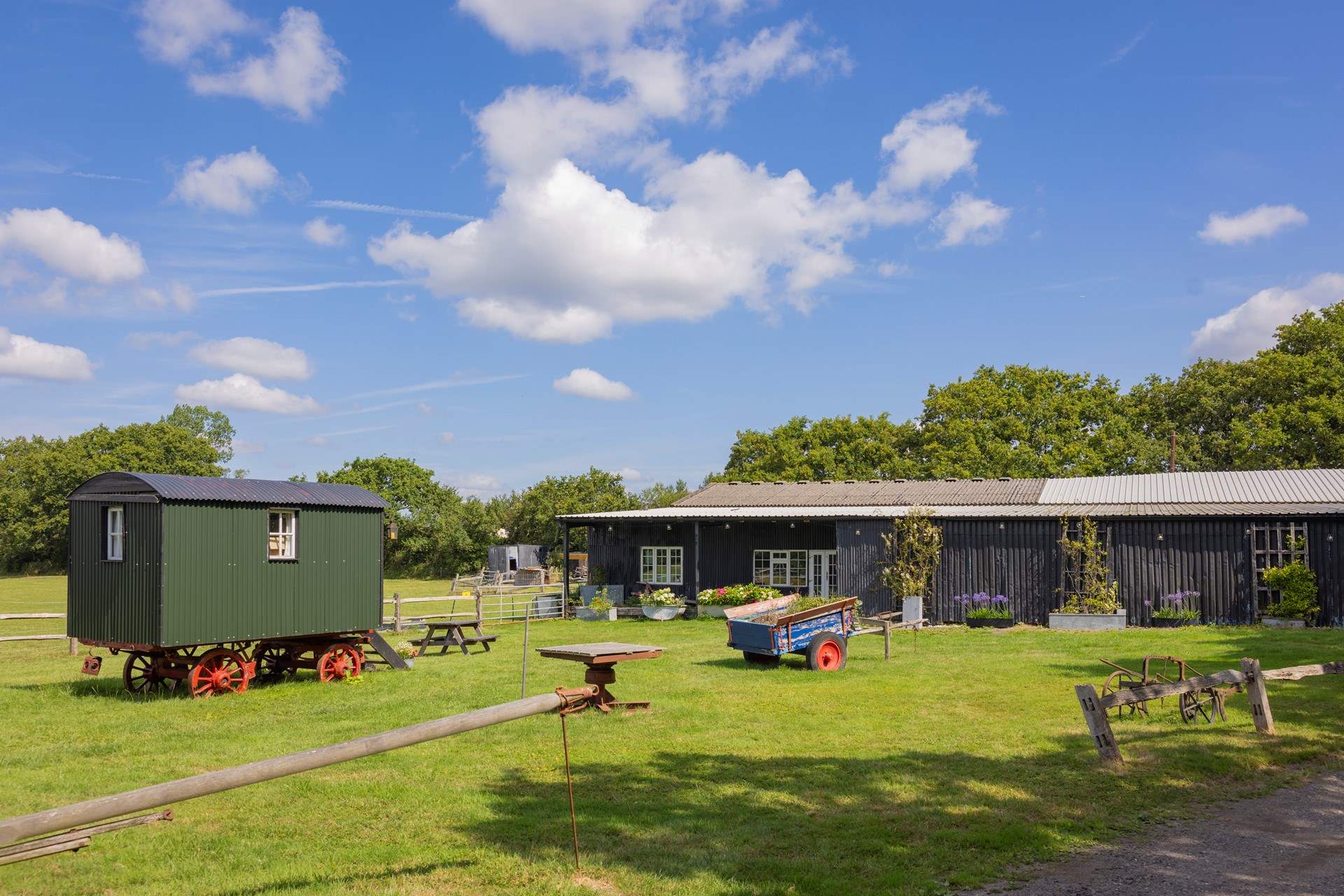 The shared lawn has a picnic bench where you can sit and watch the horses.  