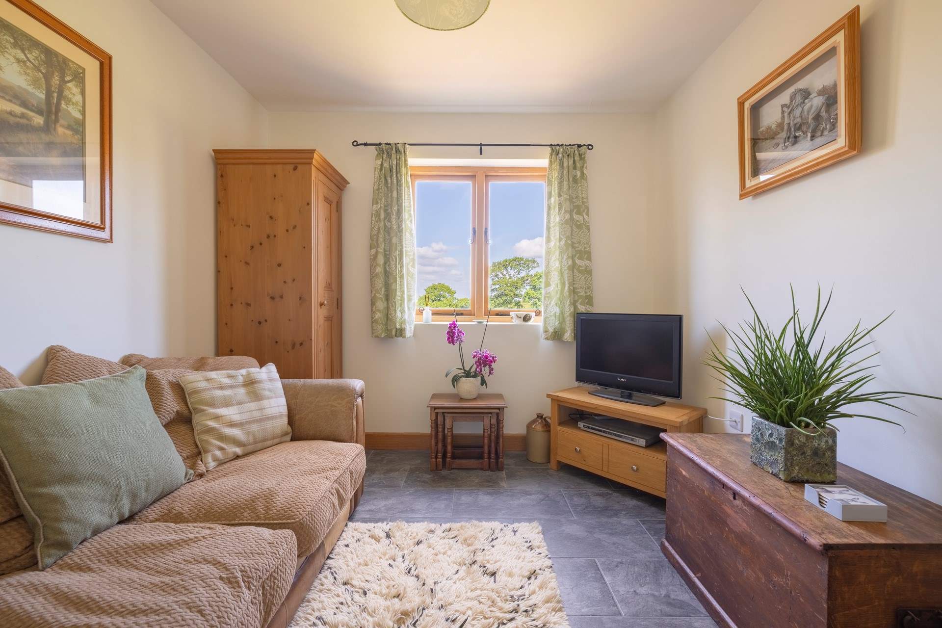 Cosy up in the sitting-room, read a book or watch a DVD.