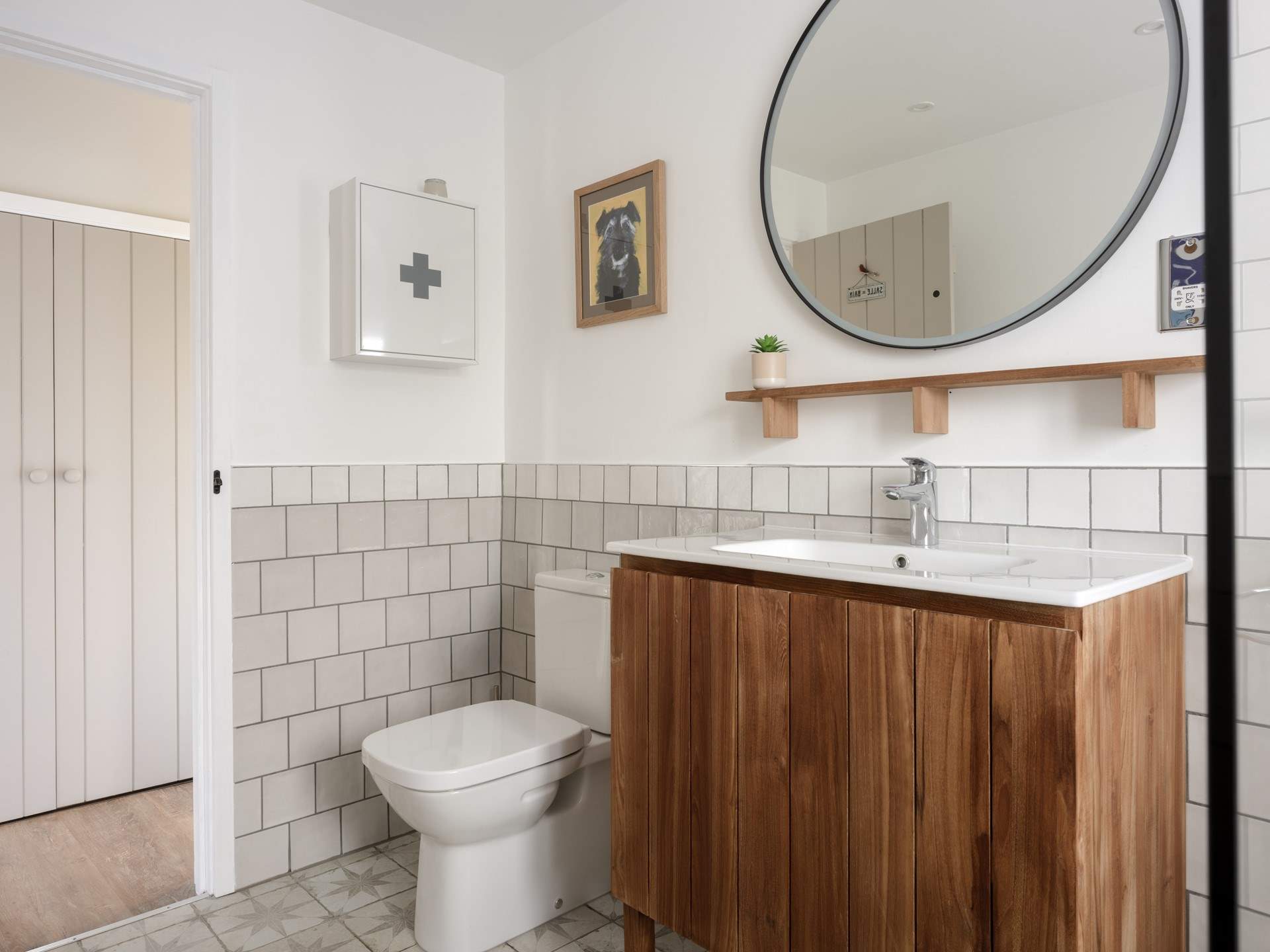 The spacious shower-room sits beside the bedroom.