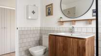 The spacious shower-room sits beside the bedroom.