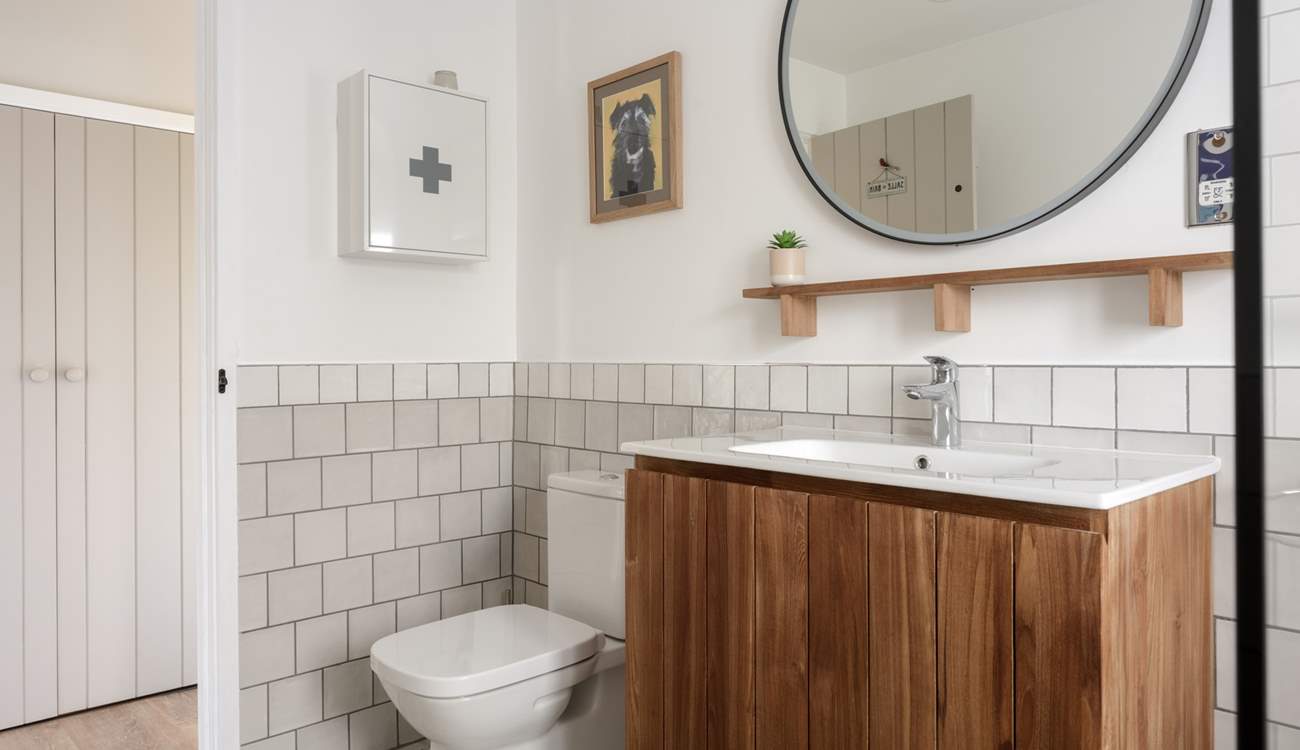 The spacious shower-room sits beside the bedroom.