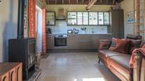 The open plan living area has plenty of space for two.
