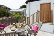 The patio has a sunny disposition.