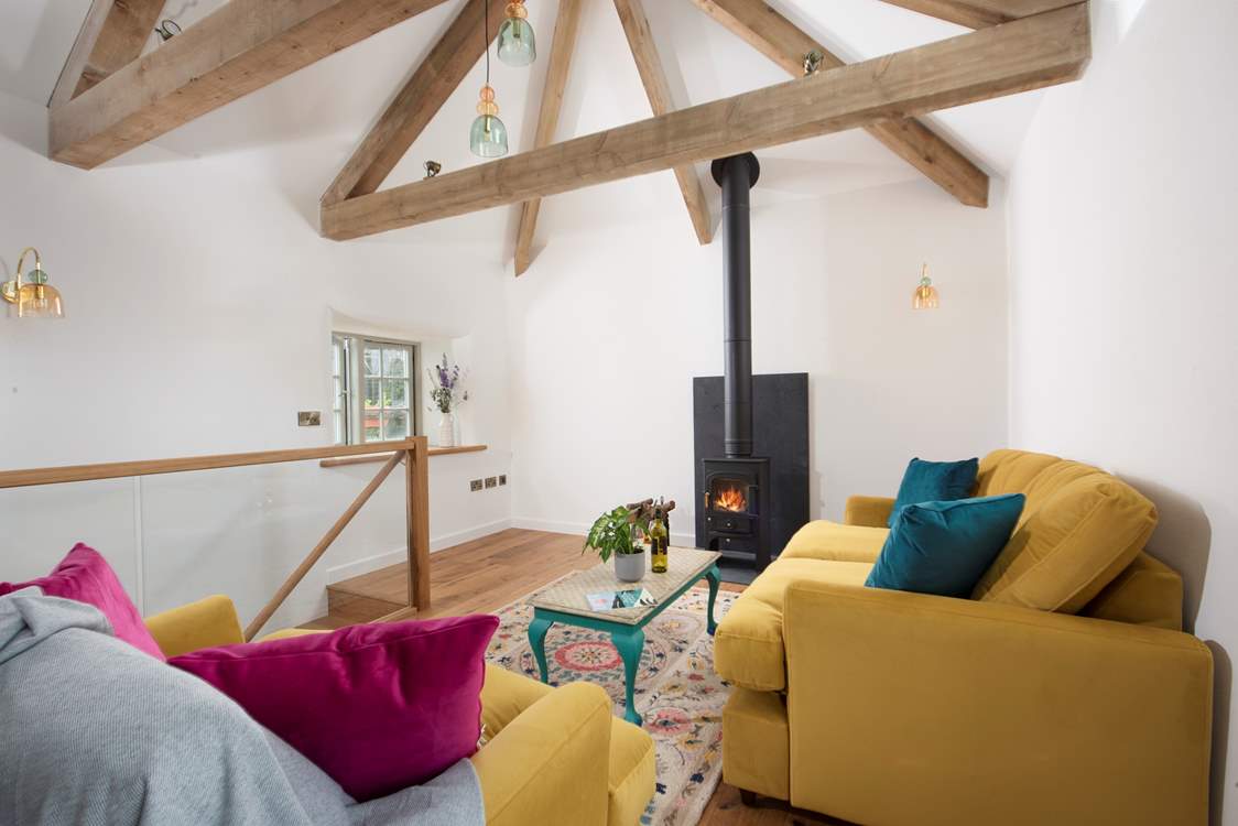 The soft rendering and sumptuous seating create a refined space.