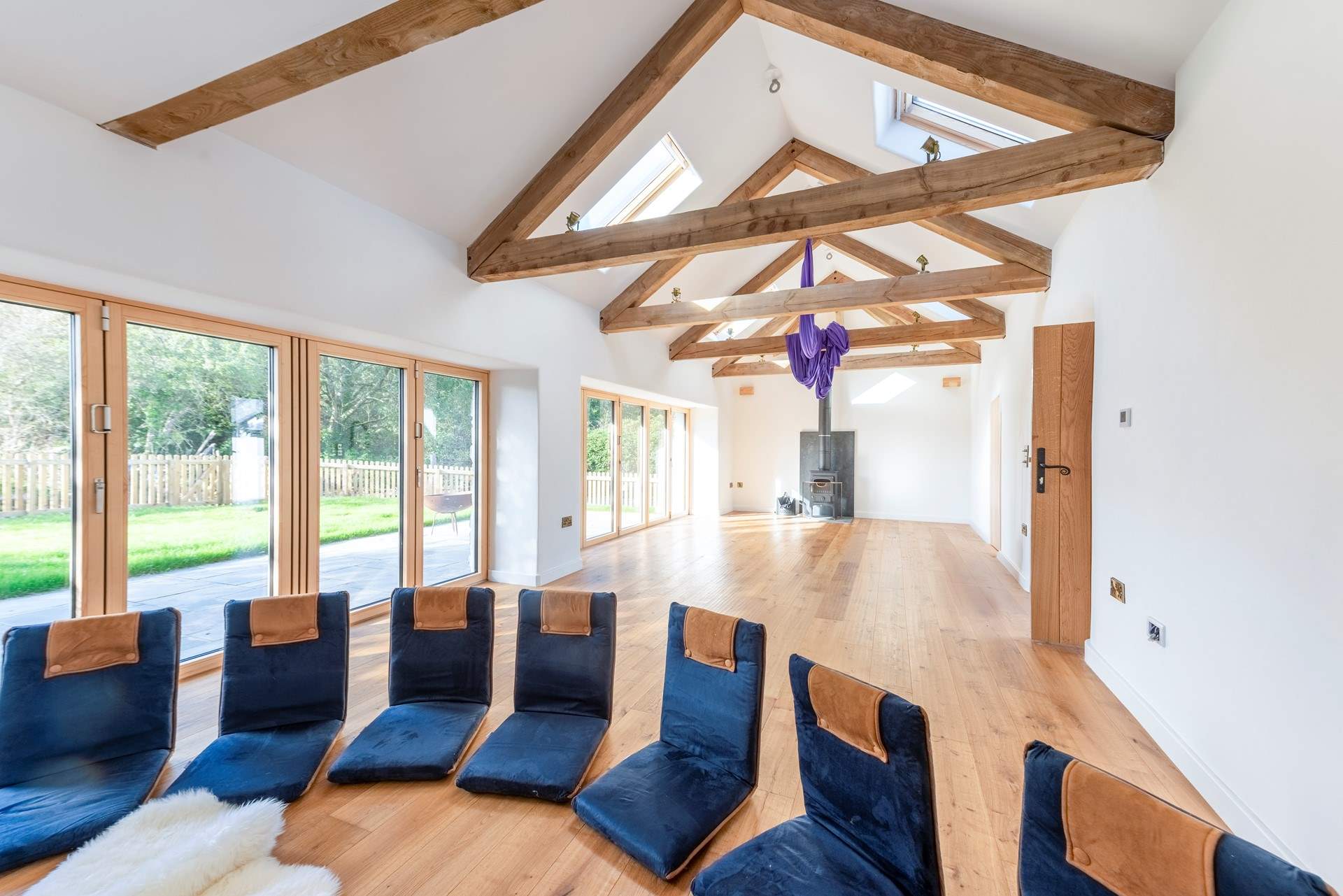 The hybrid film and yoga space is communal and inclusive, but can be reserved for your family's private use.