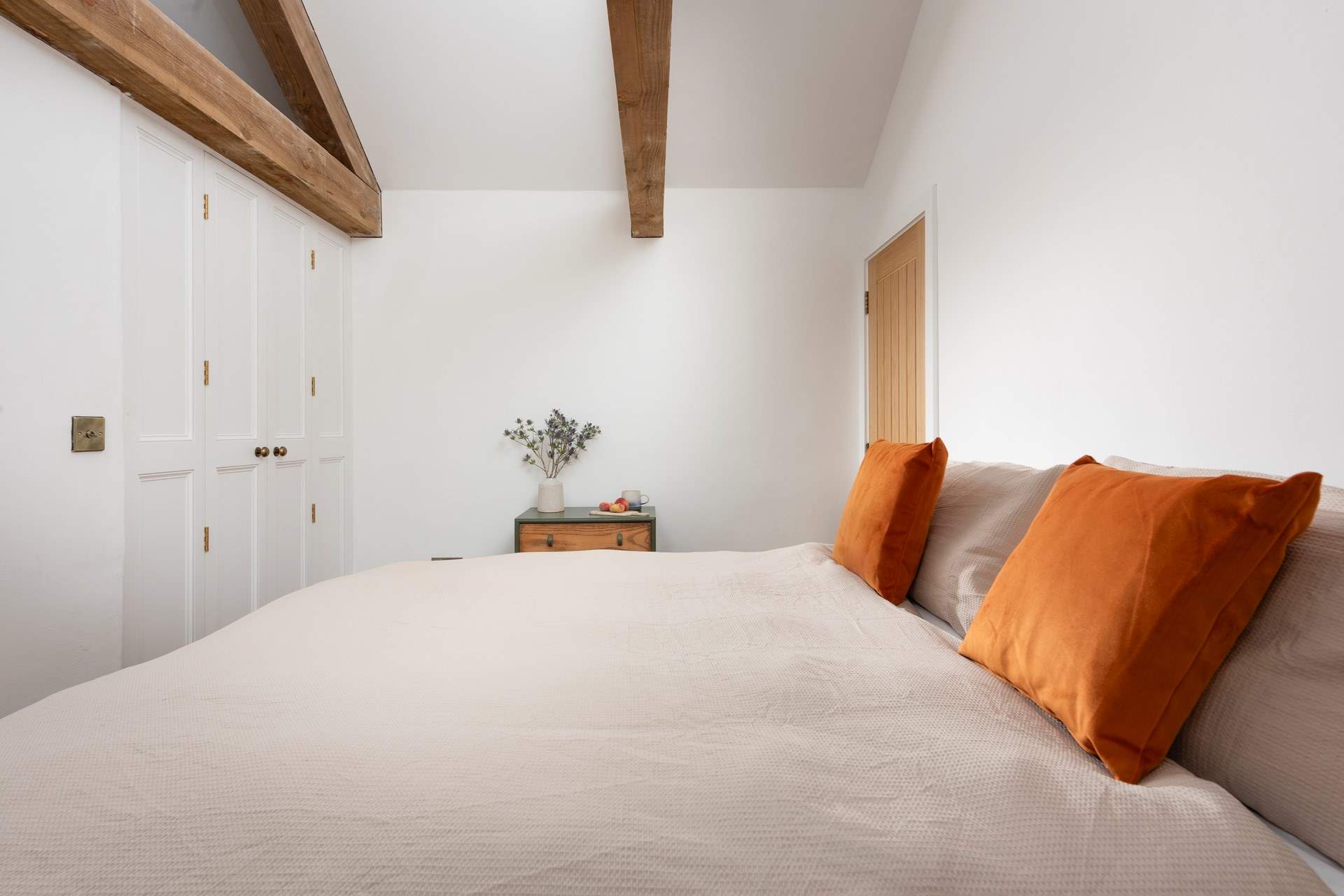 Bedroom 2 has soaring vaulted ceilings.