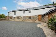 Starry Skies is semi-detached to its sister property, Swallows' Nest, with three steps up to the front door.