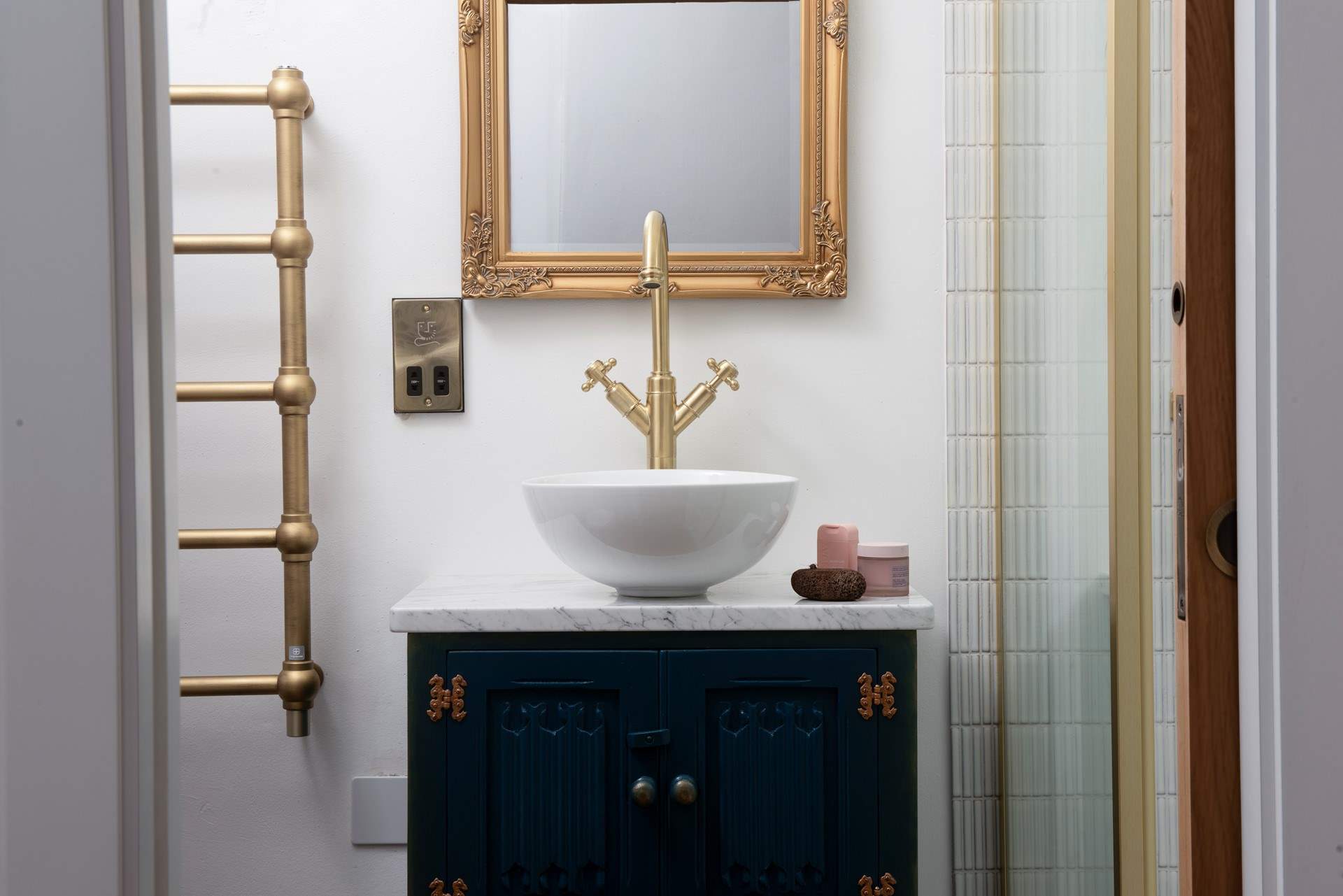 Gold accents elevate the space.