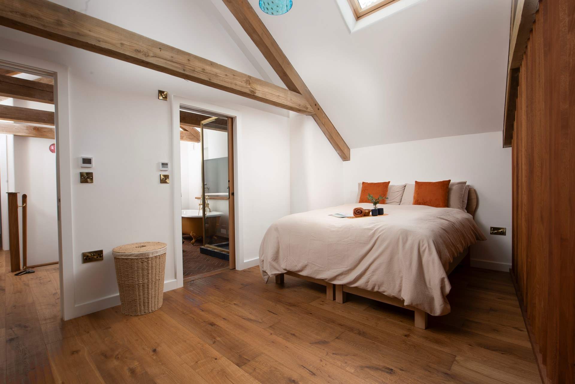 Bedroom 1 (the mezzanine bedroom) is large with a bespoke king-size bed and en suite bathroom.